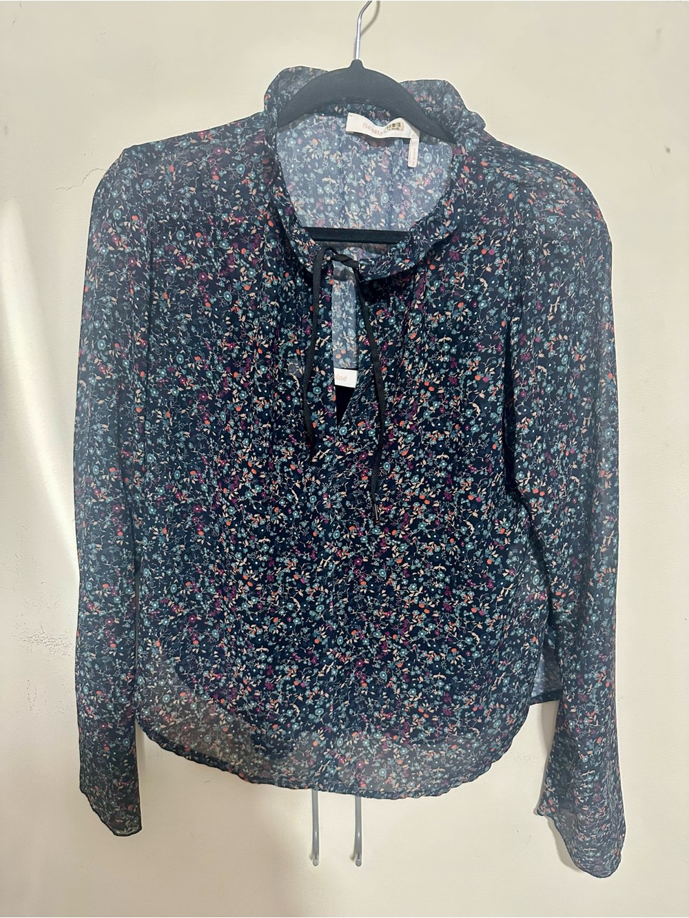See by Chloe navy floral printed top.